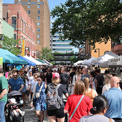 A packed street at the Farmers